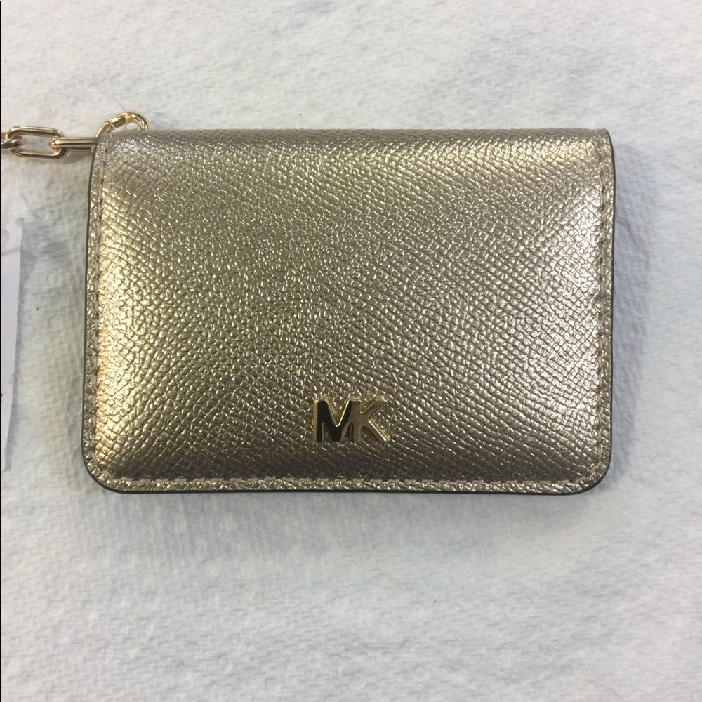 Michael Kors Key Ring Card Holder. Color Pale Gold